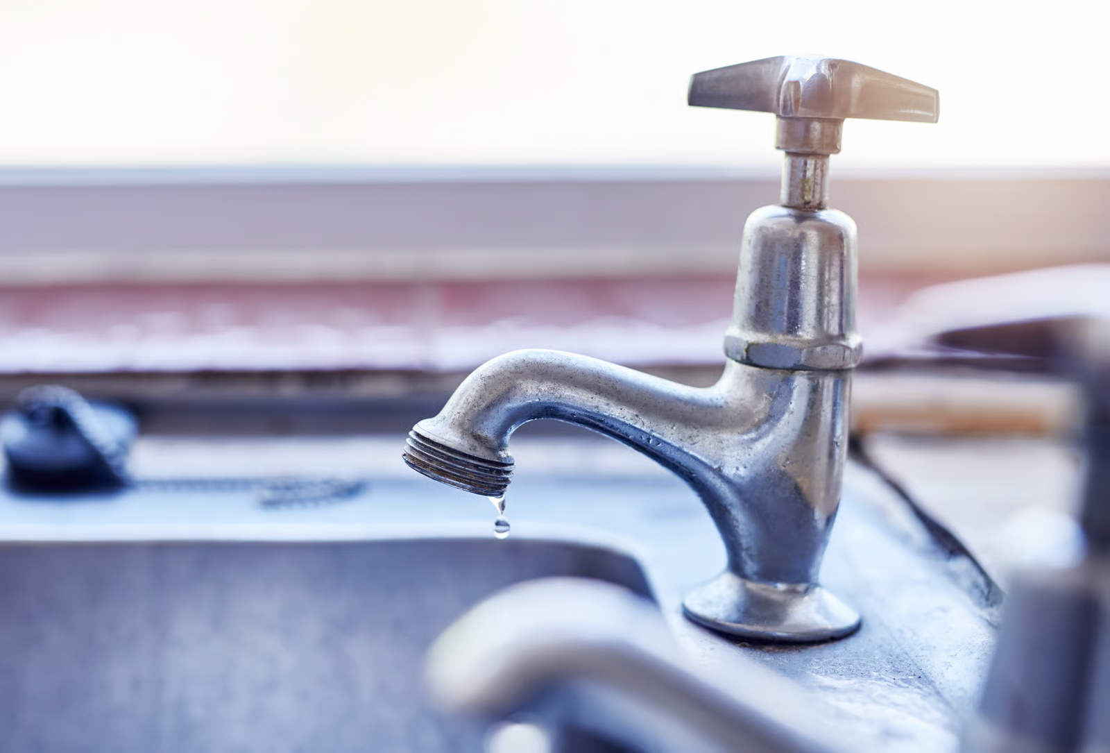 Plumbing fixture repair for dripping faucet.